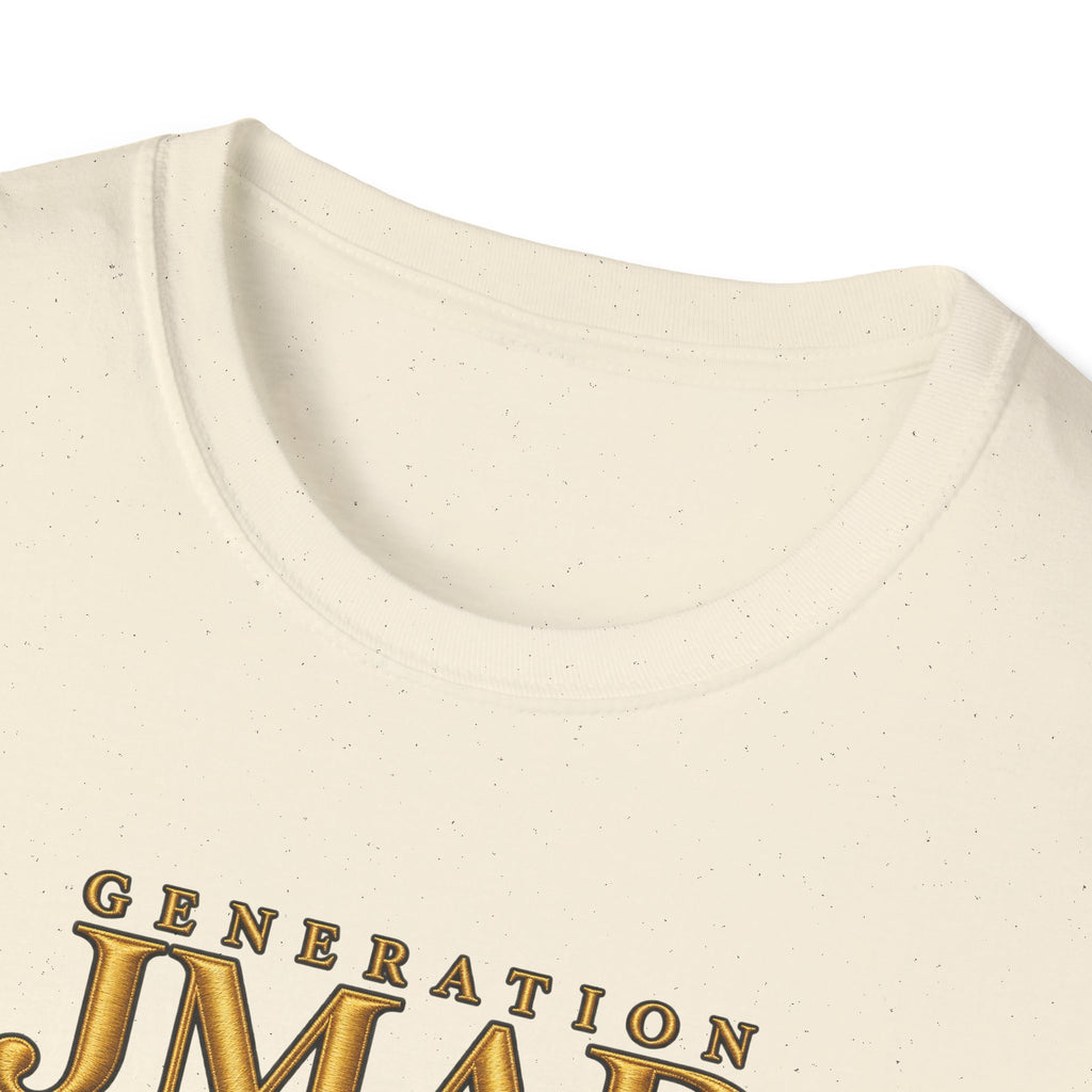 Close-up of a cream-colored t-shirt with a textured speckled finish, featuring a gold metallic-style graphic that reads 'GENERATION JMAE' on the front.